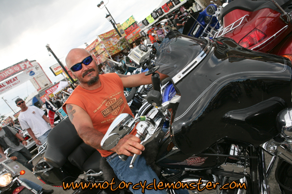bald-guy-riding-into-sturgis.jpg